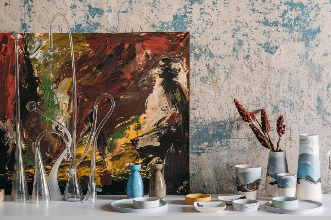 Photo by Pavel Danilyuk: https://www.pexels.com/photo/ceramic-and-glass-products-standing-on-a-table-with-a-painting-7674575/